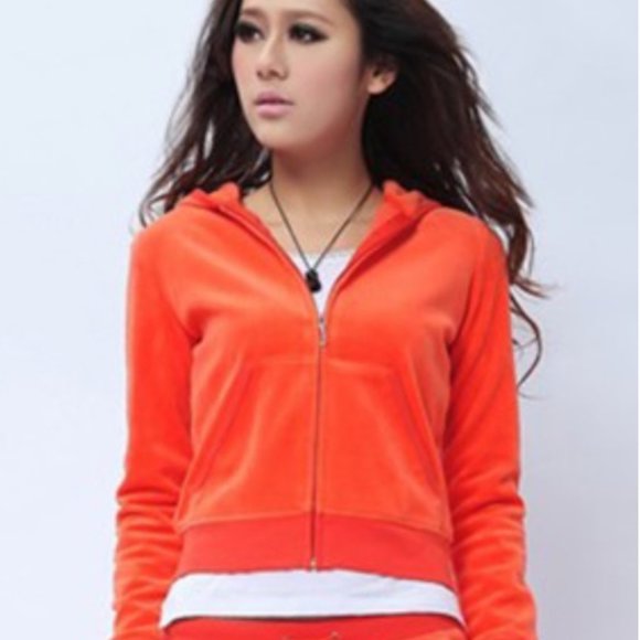 orange velour tracksuit